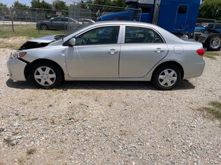 2013 Toyota Corolla L - Exterior Side Driver Image